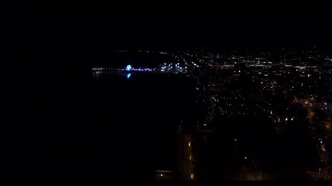 Distant view of the Malibu wheel at night Stock Footage