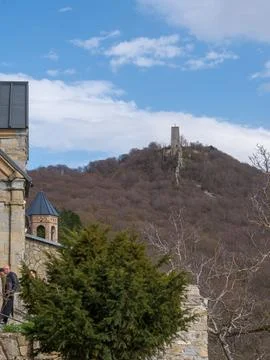 Distant view of the medieval stone watchtower on top of a mountain hill Stock Photos