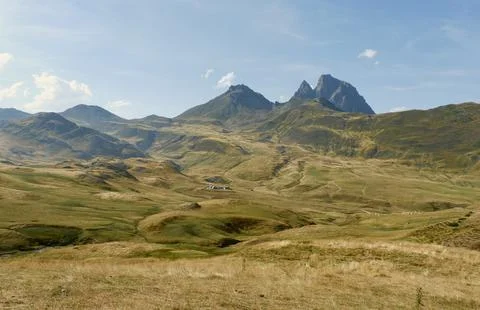 Distant view on the mountain Pic du Midi from far above the Ossau valley in.. Stock Photos
