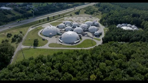 Distant View of a Mysterious Base with Connected Domes and Nearby Street Stock Footage 285540387