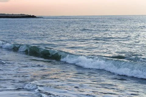 Distant View Of Ocean Waves Forming Along The Coast 写真素材