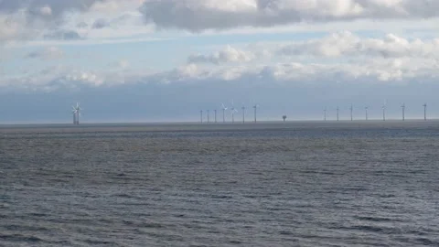 Distant view of offshore wind farm turbines. Essex coast Stock Footage 173479281