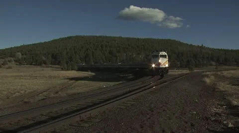Distant View of Oncoming Passenger Train 2 Stockbeeldmateriaal 18977723