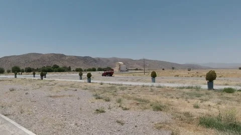 Distant view of Pasargadae with Tomb of Cyrus and service truck Stock Footage 320273983