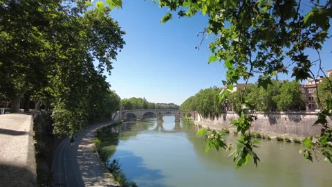 A distant view of the Ponte Sisto across the river Tiber in Rome on a spring day Stock Footage 154681332