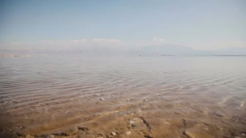 Distant view of sea and beach on a sunny day. Dead sea near Ein Bokek, Israel Stock Footage 181651569