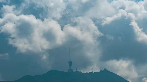 Distant View Time-lapse Footage of Wutong Mountain TV Tower in Shenzhen Unde Video stock 339307031