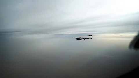 Distant view of U.S. and Saudi Air Force F-15 Eagles flying in formation Stock Footage 109160460