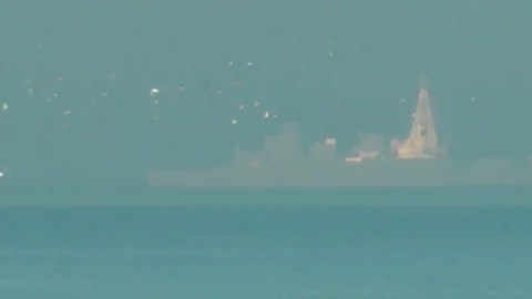 Distant warship Stock Footage 104311998