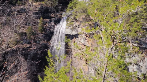 Distant Waterfall in Rock Canyon Stock Footage 48505545