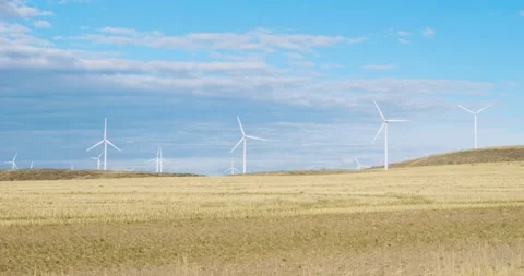 Distant Windmills Handheld - Windfarm 5.7k Video stock 237415937