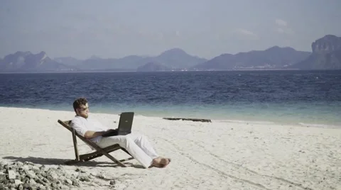 Distant work on the beautiful beach. Stock Footage 60781365