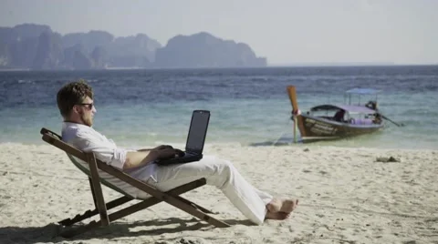 Distant work on the beautiful beach. Stock Footage 60781390