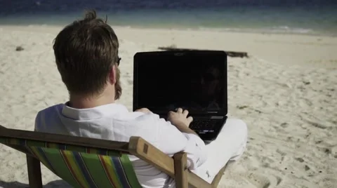 Distant work on the beautiful beach. Stock Footage 60781411
