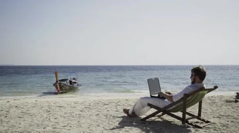 Distant work on the beautiful beach. Stock Footage 60781429