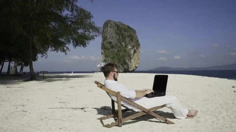 Distant work on the beautiful beach. Stock Footage 60781442