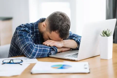 Distant work man business freelancer home office tired Stock Photos