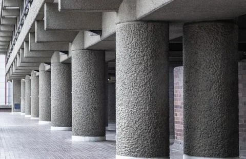 The distinctive textured concrete columns often referred to as bton brut (r.. Stock Photos