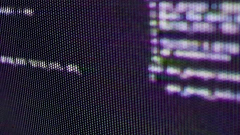 Distorted Abstract Macro Close up of Computer Screen Pixels and Scrolling Code Stock Footage 219603331