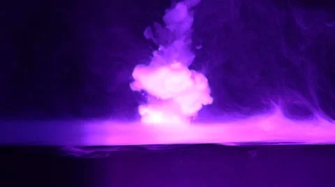 Distorted Drops Fall Like Rain in a Purple Cloud Tank Stock Footage 62579051