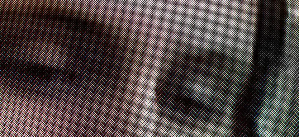 Distorted human face on screen pixel texture Stock Photos