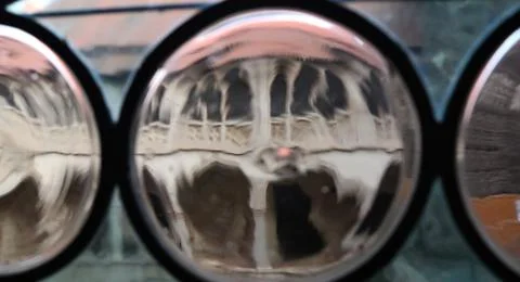 Distorted image in a circle-shaped window Stock Photos