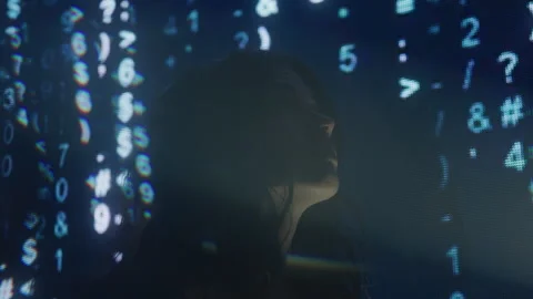 Distorted Profile of Android Opening Eyes and Looking Inside Binary Code Stock Footage 219597137