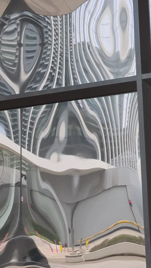 Distorted reflection in glass of building at canary wharf Stock Footage 288113725