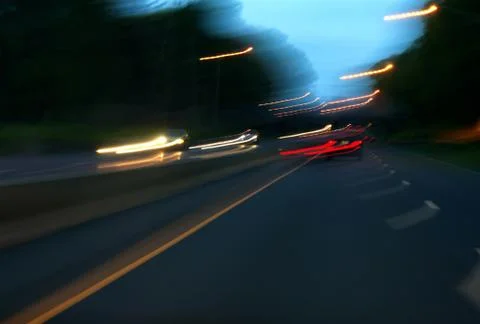 Distorted street scene as seen from drunk, drugged, or sleepy drivers. Or may Stock Photos