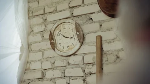 Distorted Vintage Wall Clock Ticking on Brick Wall Background Stock Footage 317696025