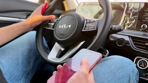 Distracted Driver Using Smartphone Inside Modern Car Stock Footage 343911790