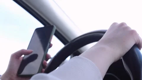 Distracted Driving: Smartphone Use While Driving in Traffic Stock Footage 295880252