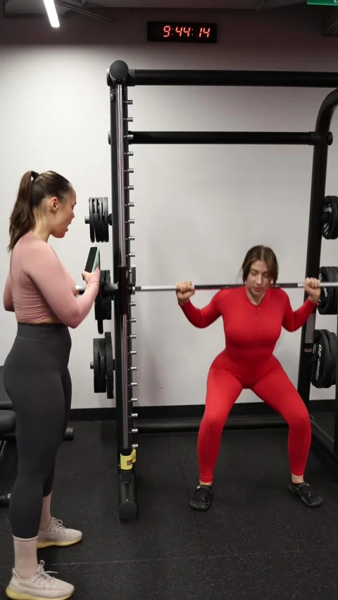 Distracted gym partner Stock Footage 337956715