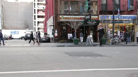 Distracted man texting narrowly avoids accident HD0816 Stock Footage 12517872