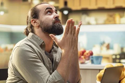 Distraught man being troubled by work mistake and failure Stock Photos