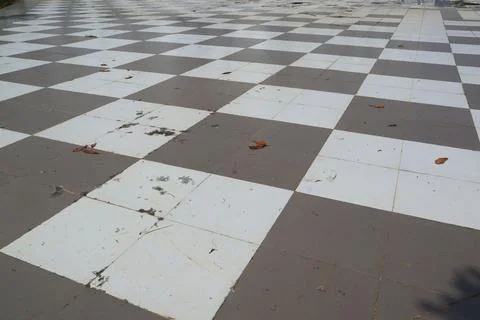 Distressed Checkerboard Pavement Texture Stock Photos