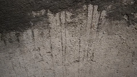 Distressed concrete wall texture with dark weathered grunge surface Stock Photos