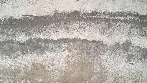 Distressed concrete wall texture with horizontal grey weathered grunge pattern. Stock Photos