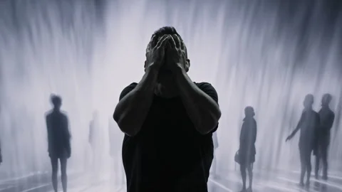 Distressed Person Surrounded By Shadowy Figures Mental Health Anxiety Depression 動画素材 288886730