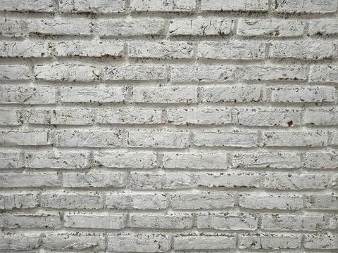 Distressed white painted brick wall texture background. Stock Photos
