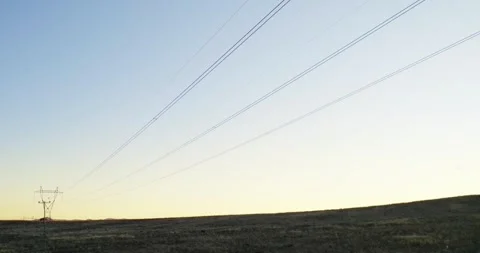 Distribution electric substation with power lines and transformers at sunset, Stock Footage 333722797