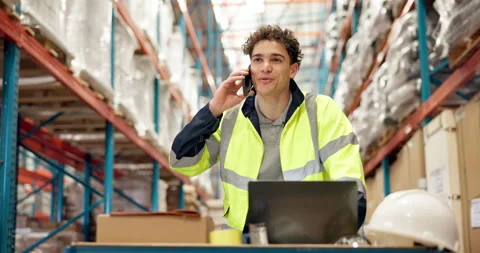 Distribution, phone call and worker in warehouse with laptop, happy conversation Stock Footage 318641560