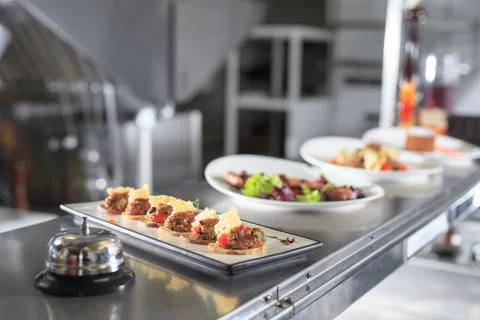 The distribution table in the kitchen of the restaurant Stock Photos
