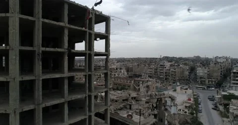 A district in Aleppo. We can see the roofs of the buildings in the syrian city i Video stock 149572936