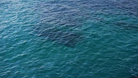Disturbed blue ocean water surface. Nice looping background Stock Footage 108490994