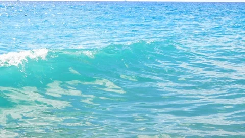 Disturbed sea waves with foam view and sky reflection in summer day. Sea surface Stock Footage 112881647