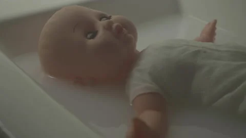 Disturbing Footage of a Creepy Doll Half... Stock Video Pond5