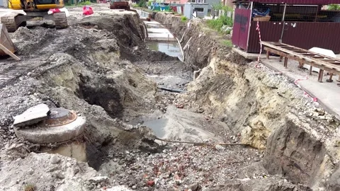 A ditch dug by a bulldozer Stock Footage 209357672