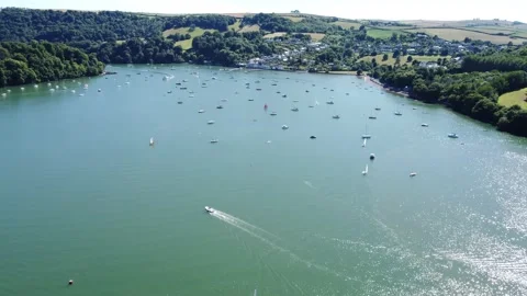 Dittisham, South Devon, England: Drone View: Yachts, River Dart &amp; the village Stock Footage 201208175