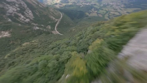 DIVE BETWEEN TREES AND RAILROAD TRACKS CINEMATIC FPV 4K - UHR -HDR Stock Footage 231166393